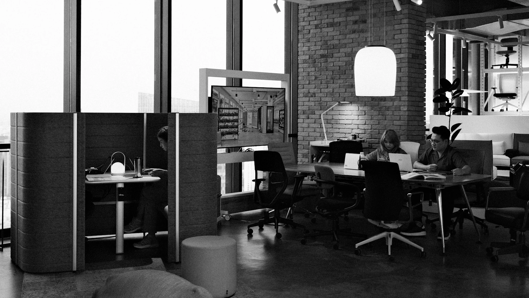 Professionals working in a contemporary open-plan office